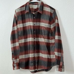 Woman’s flannel shirt.